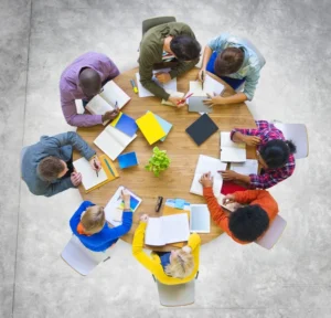 depositphotos 77089237 stock photo team meeting brainstorming concept